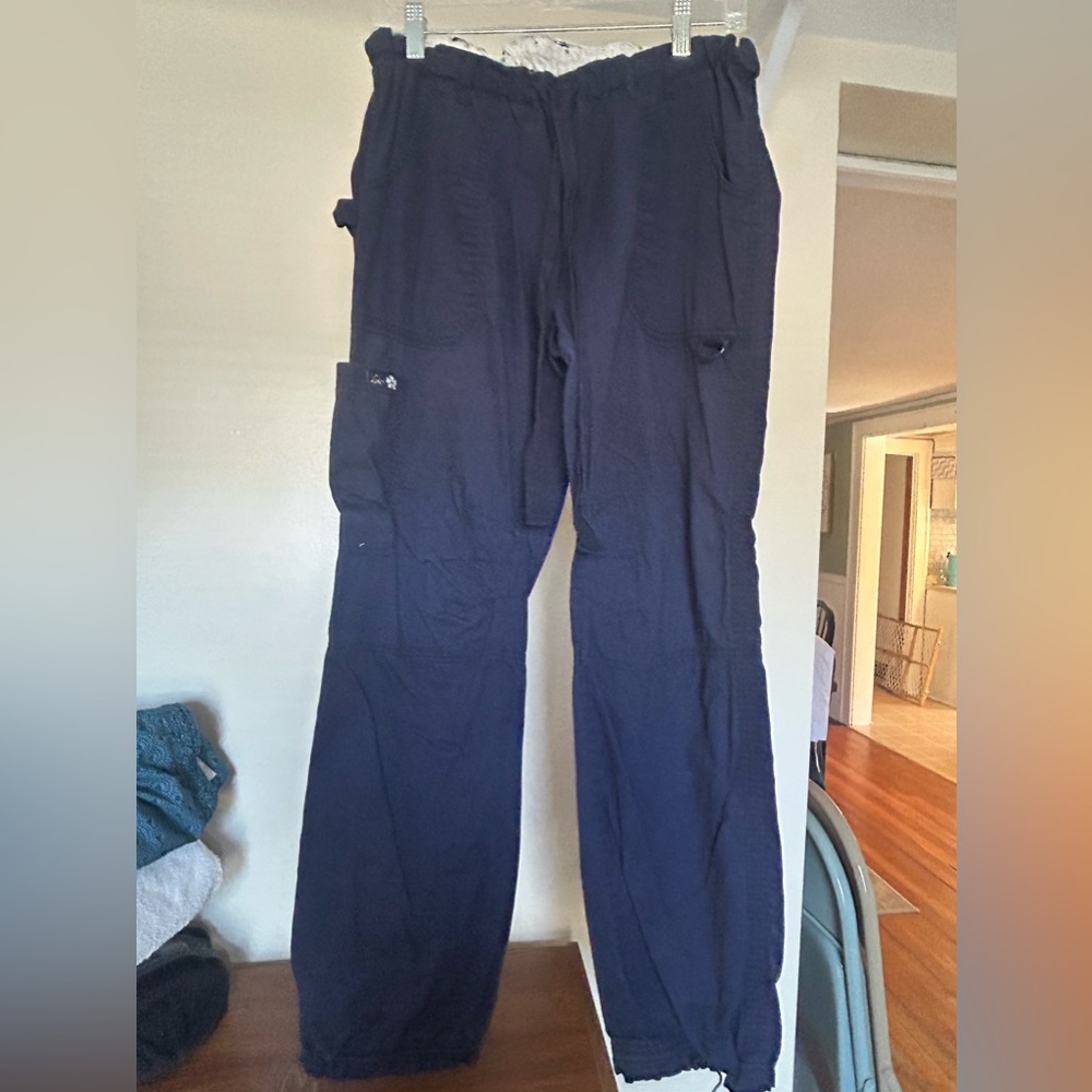 Navy blue Koi size medium scrubs.